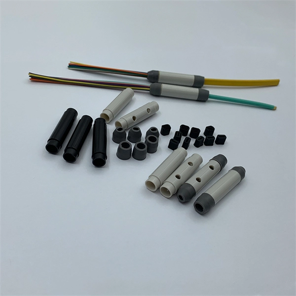 Auxiliary tools for laying fiber optic cables in low-voltage wells